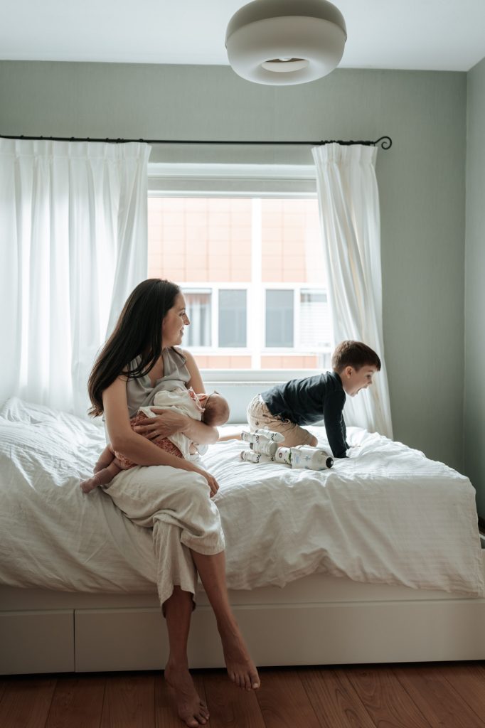 Parents and child at home in a documentary family photoshoot in the Netherlands