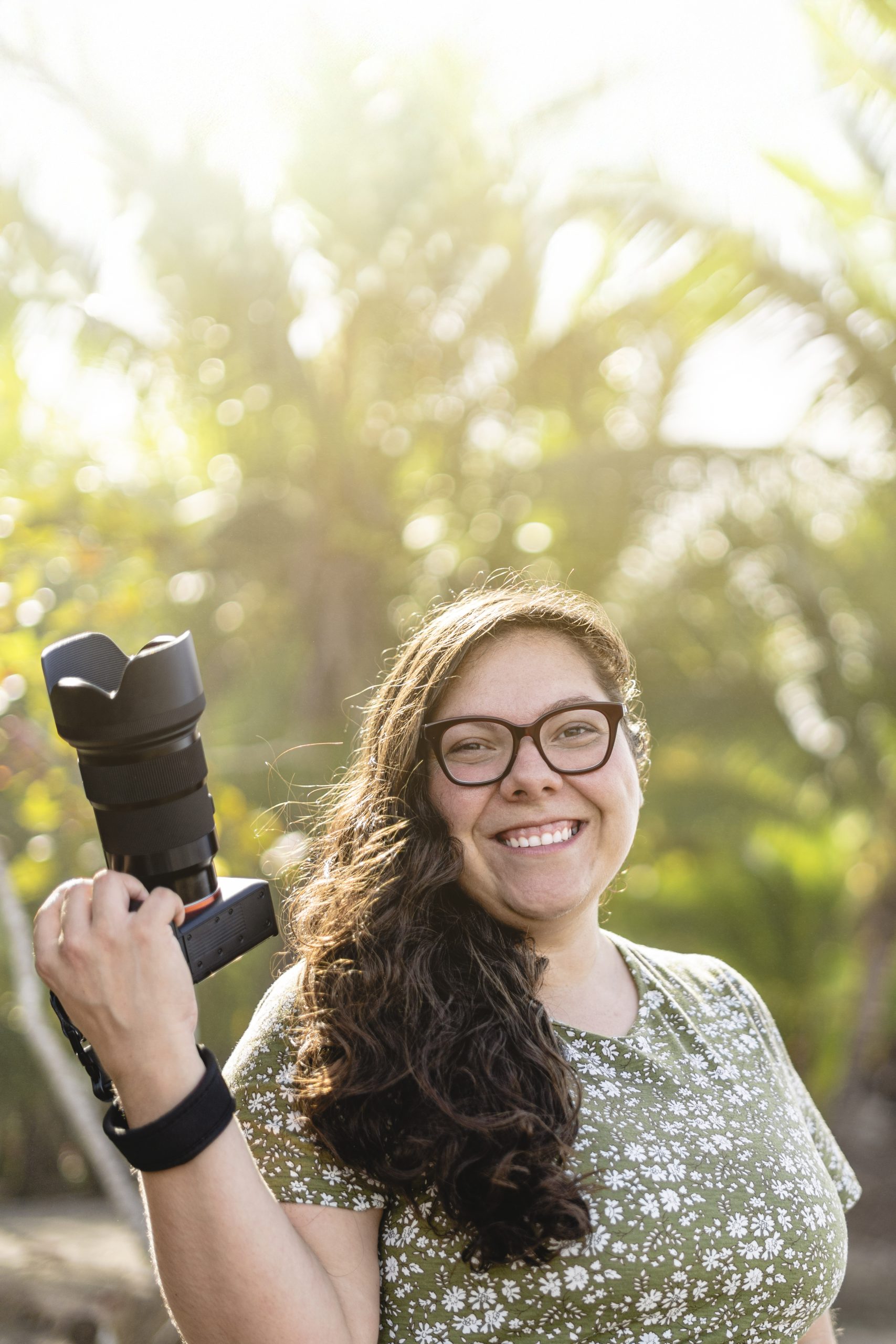 Ka Monge photographer holding camera Costa Rica birth family wedding photographer Netherlands