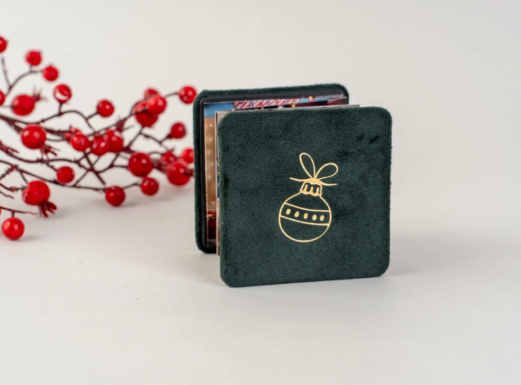 Small green velvet accordion-style Christmas mini album with gold ornament design — 8x8cm photo keepsake