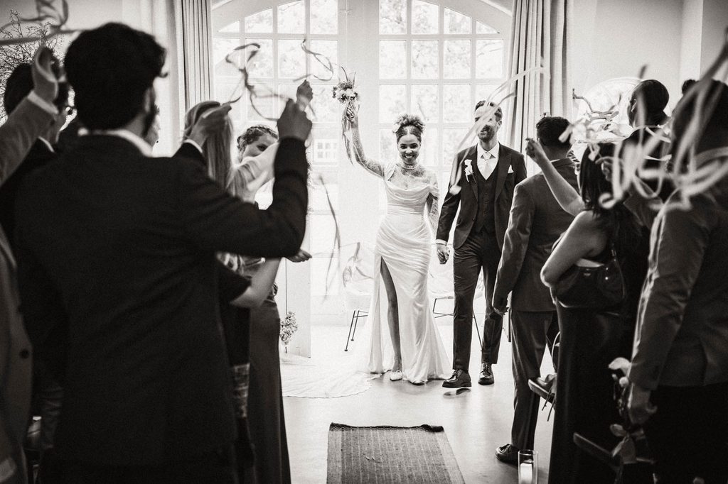 Wedding ceremony with friends and family around the couple, Mexican-Dutch wedding in the Netherlands