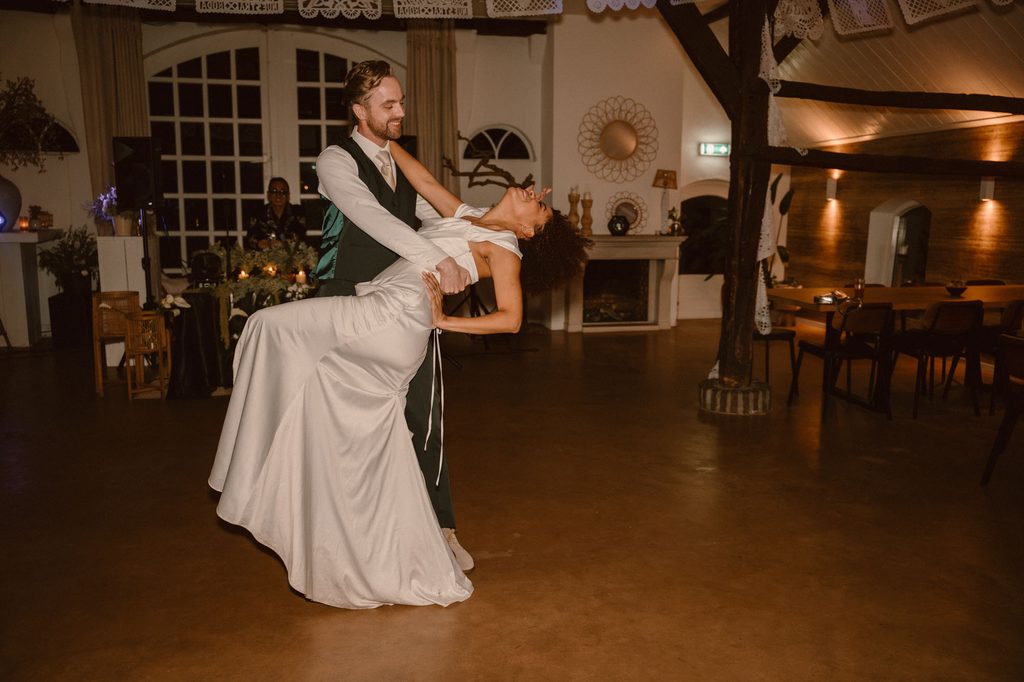 Bride and groom first dance at the wedding party, Mexican-Dutch wedding in the Netherlands