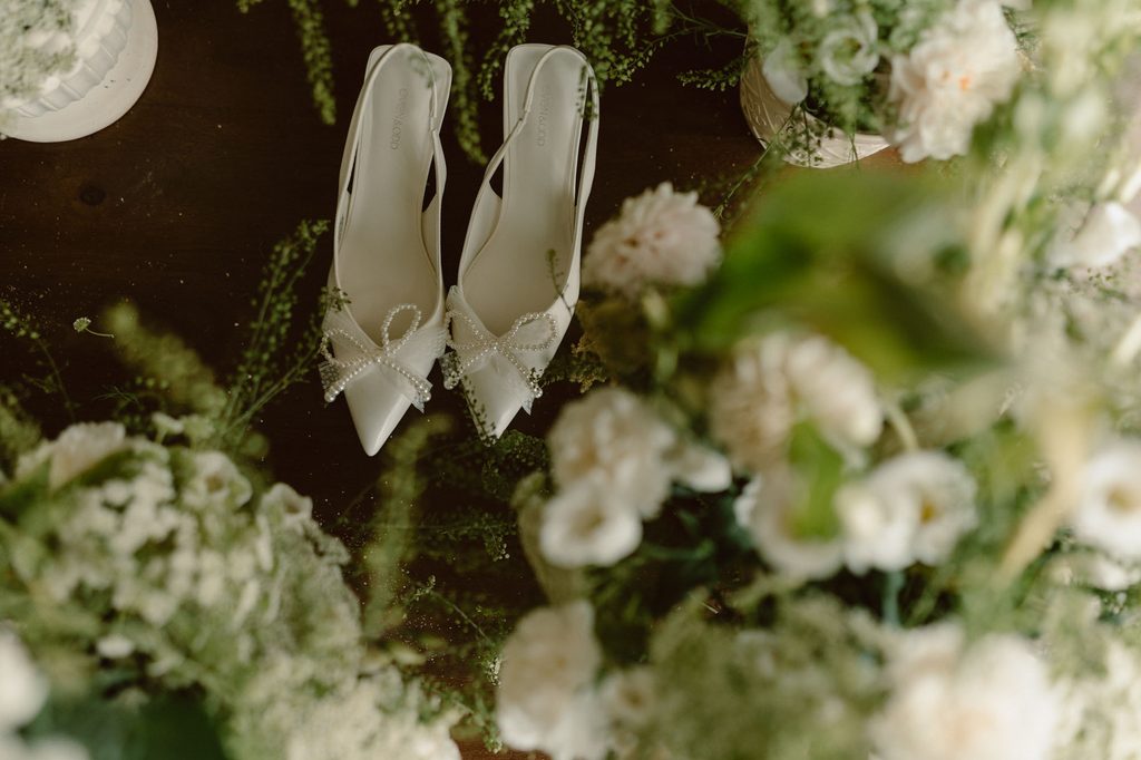 White bridal bouquet with green leaves, Mexican-Dutch wedding in the Netherlands